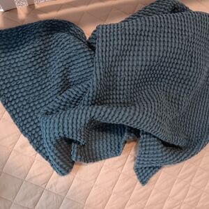 A teal wool throw
